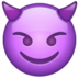 Smiling face with horns